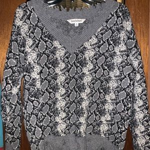 Snake print distressed sweater